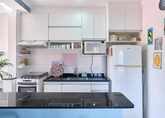 2 Quartos com ar, piscina, sacada Gourmet a 1 km da praia Grande